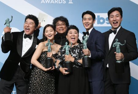 The cast of Parasite celebrating their SAG award win